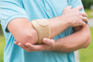 An elbow brace can alleviate pain caused by Golfer's Elbow
